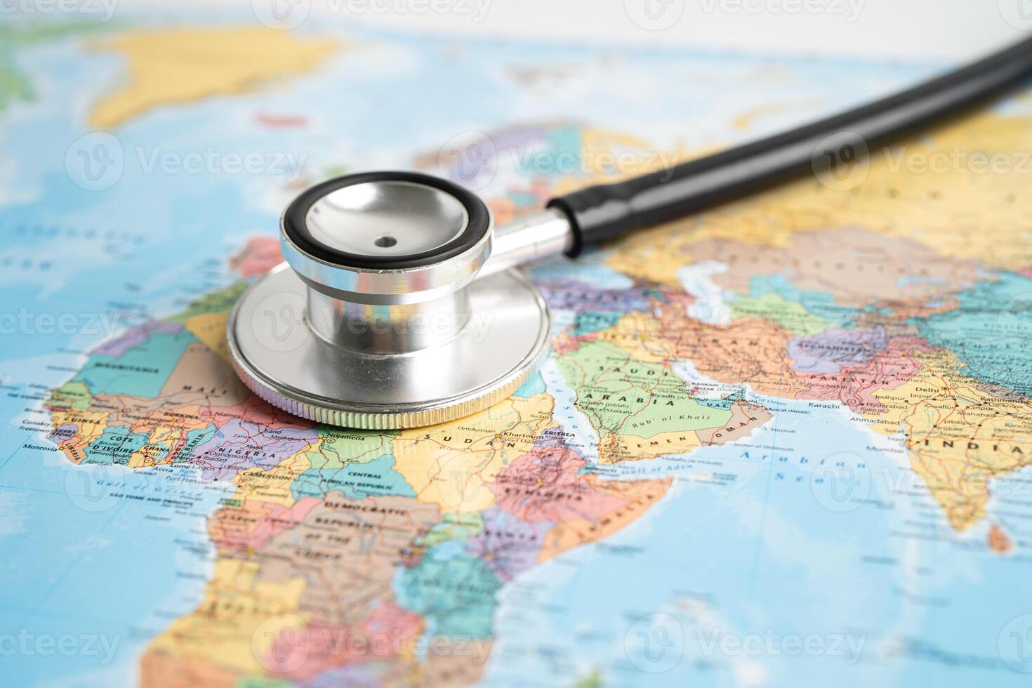 Bangkok, Thailand June 1, 2022, Stethoscope on Africa world globe map background. photo