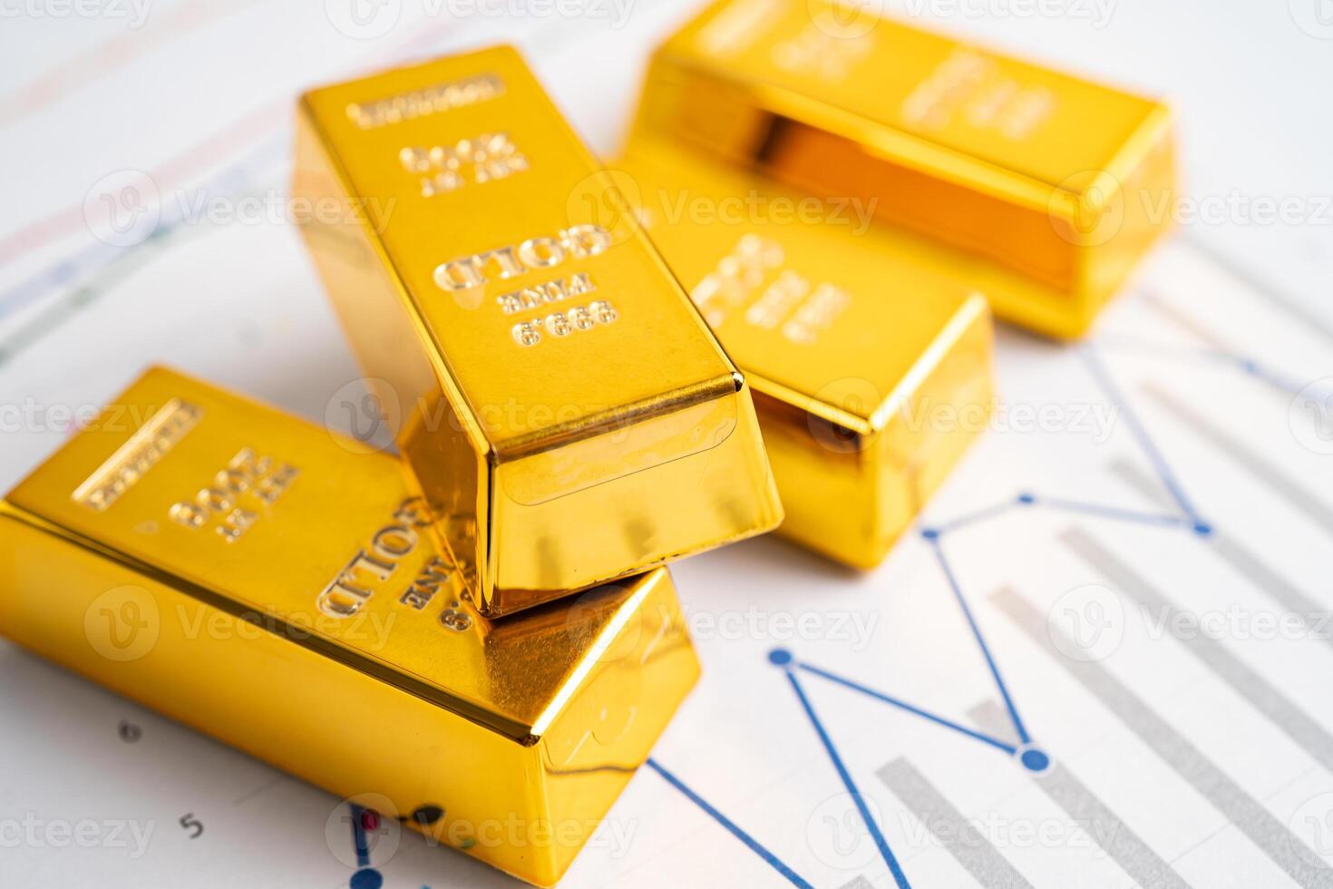 Gold bar on graph, economy finance exchange trade investment concept. photo