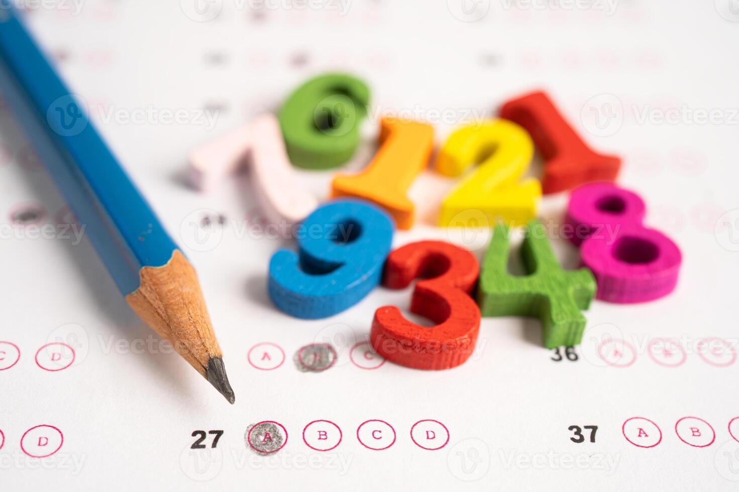 Math number and pencil on answer sheet paper, Education study testing learning teach concept. photo