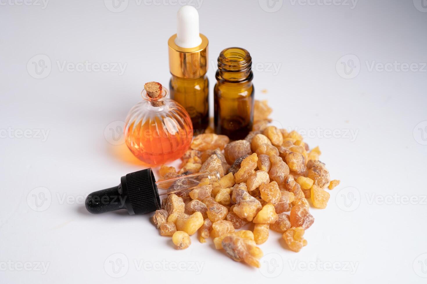 Frankincense or olibanum aromatic resin isolated on white background used in incense and perfumes. photo
