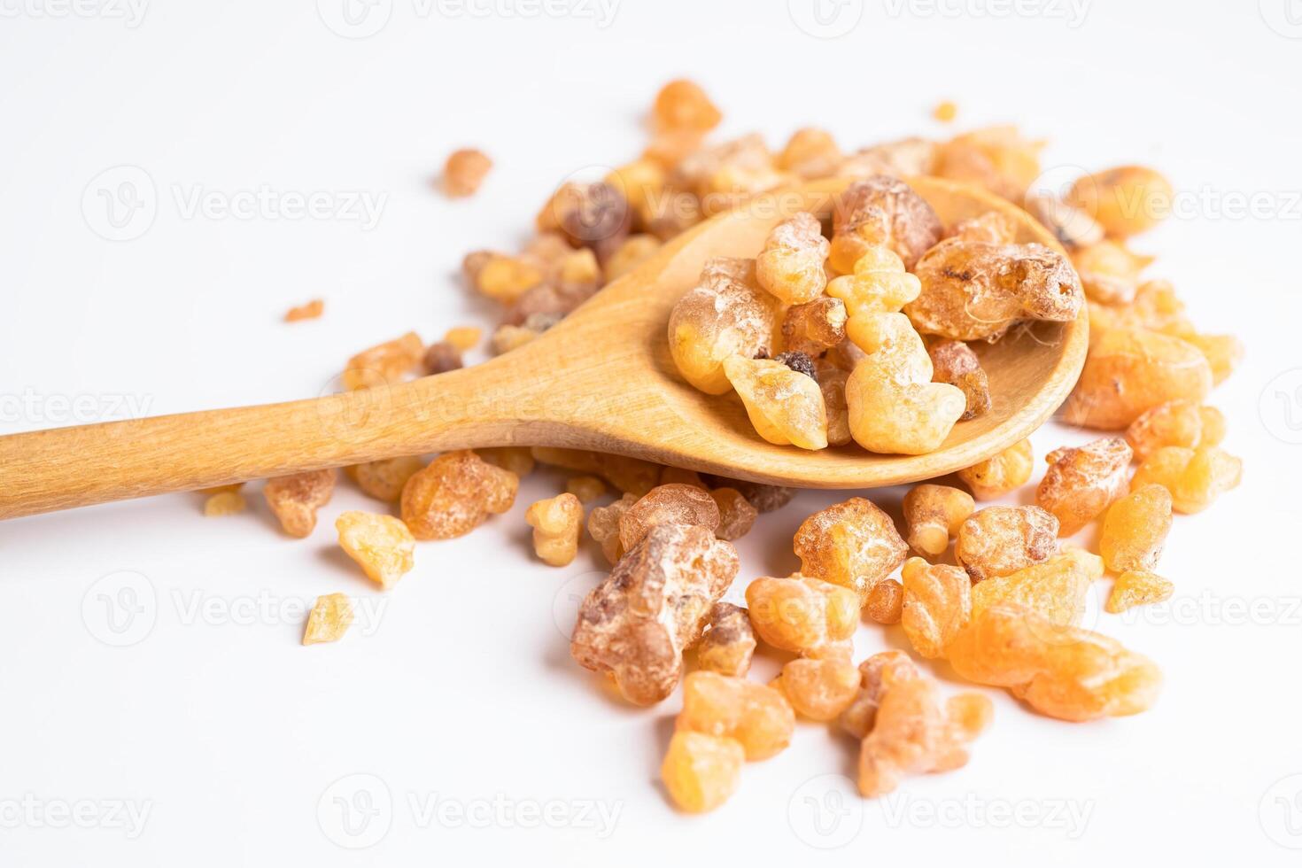 Frankincense or olibanum aromatic resin isolated on white background used in incense and perfumes. photo