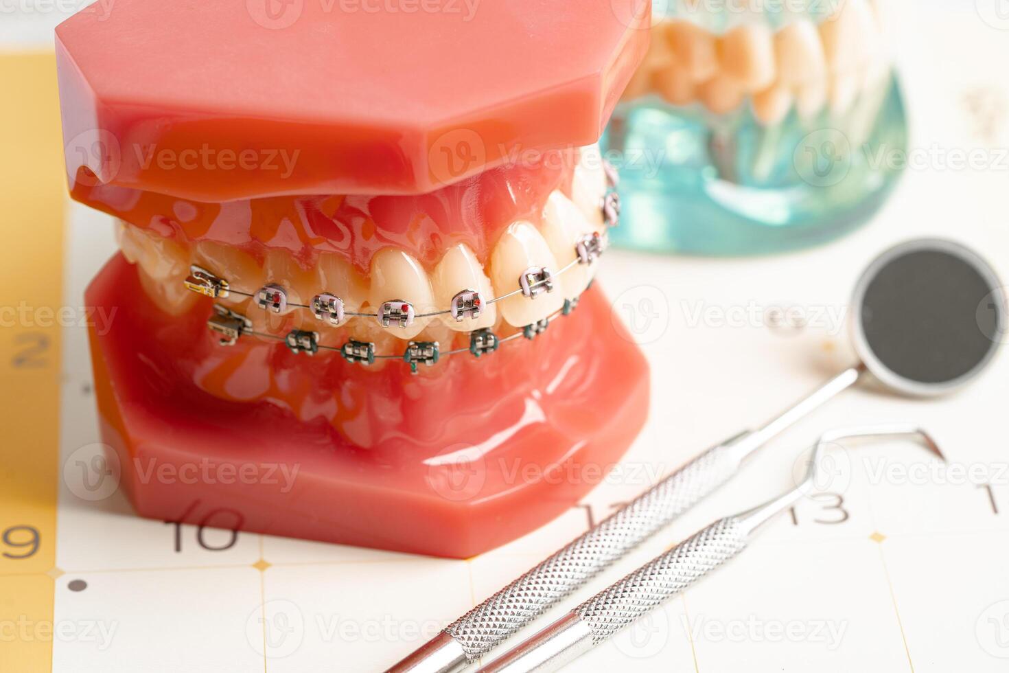 Dental appointment reminder in calendar, healthy teeth, dental health care. photo