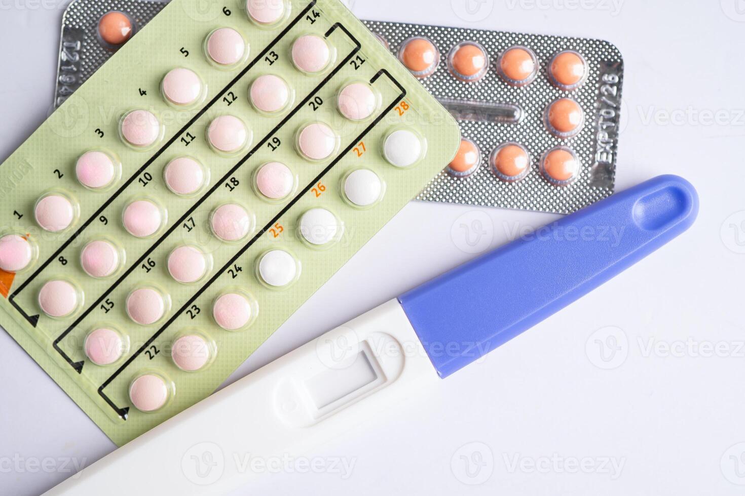 Pregnancy test and birth control pills, contraception health and medicine. photo