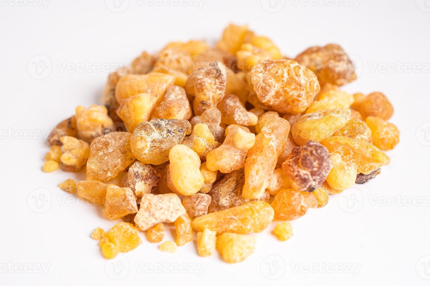 Frankincense or olibanum aromatic resin isolated on white background used in incense and perfumes. photo