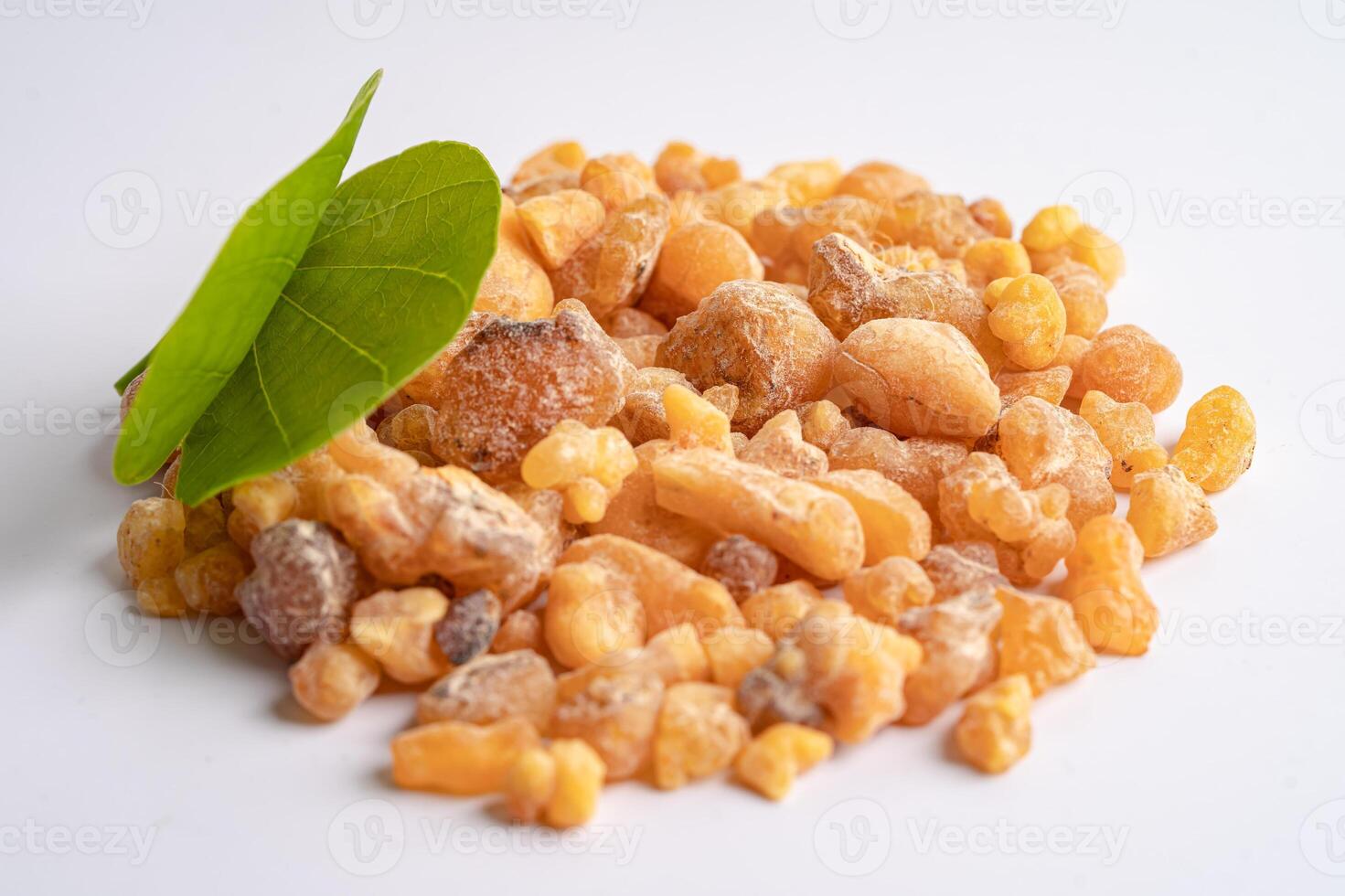 Frankincense or olibanum aromatic resin isolated on white background used in incense and perfumes. photo