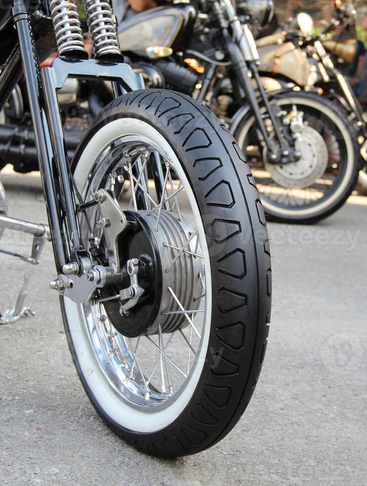 Whiteside Tire Of Classic Chopper Motorcycle At The Moto Show photo