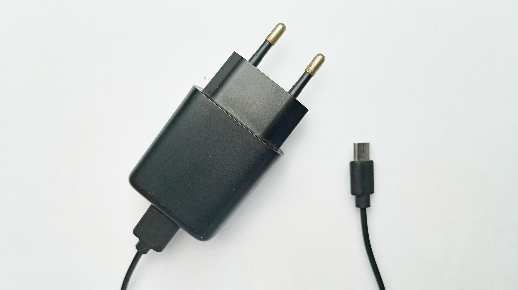 cell phone charger adapter on white background photo