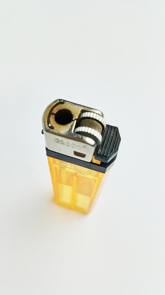 Cigarette gas lighter, isolated on white background photo