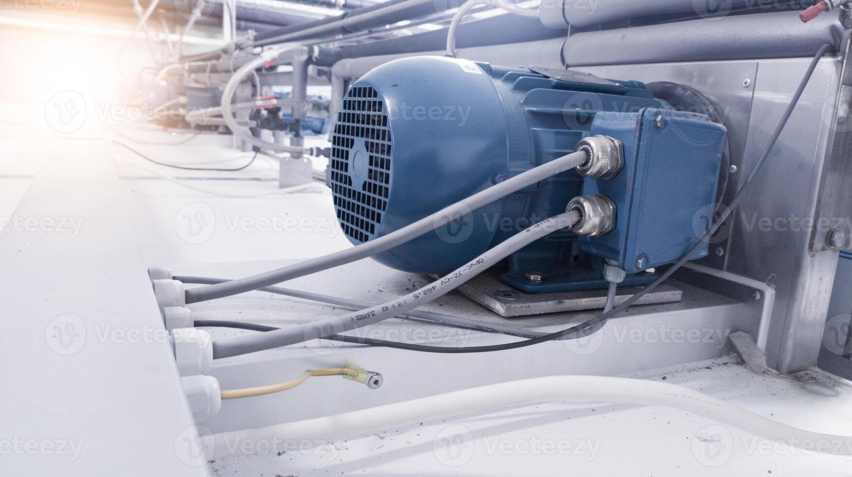 Installation of machine controls and electric motor power cables via cable glands. photo