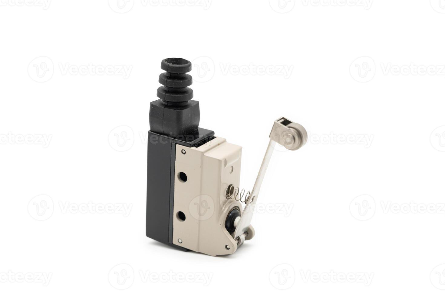 Limit switch sensor of the machine. limit switch for mechanical movement and actuators limits. isolated on white background of limit switch, control device, electrical equipment in control system. photo