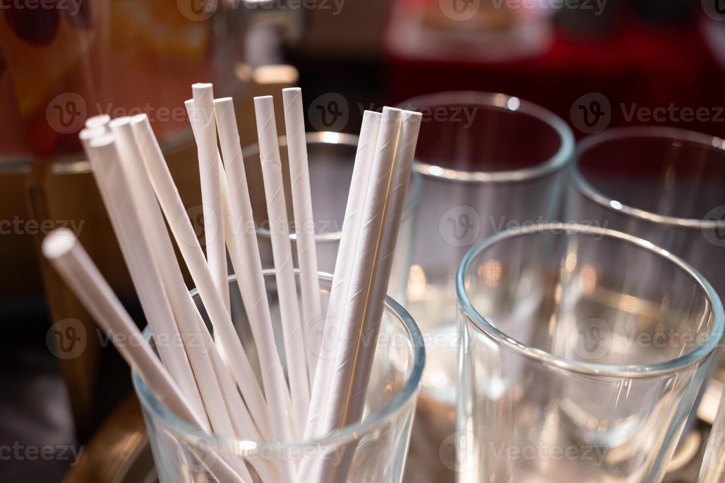 Paper straws made of eco friendly paper. Close up on white paper straws facing upwards. ecologically friendly yet durable paper drinking straws. photo