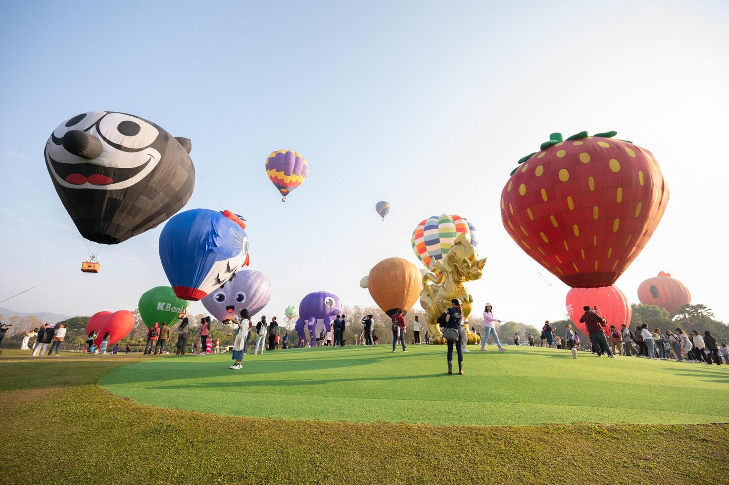 Chiang Rai, Thailand - February-14-2024 - International ballon fiesta 2024 festival in Singha park, Chiang Rai. This event is the year to experience giant balloons up close in Thailand. photo