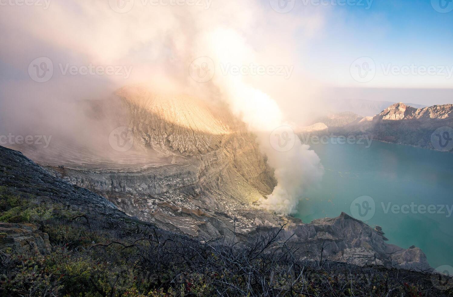 Beautiful landscape of Kawah Ijen volcano in East Java of Indonesia at dawn. One of the most dangerous tourist destination in the world. photo