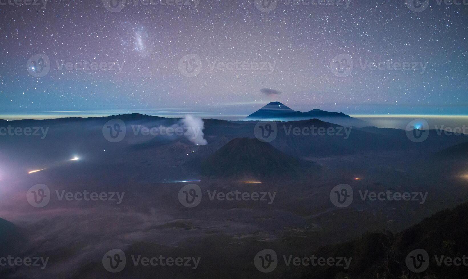 Night view of Mount Bromo an active volcano part of the Tengger massif, in East Java, Indonesia. photo