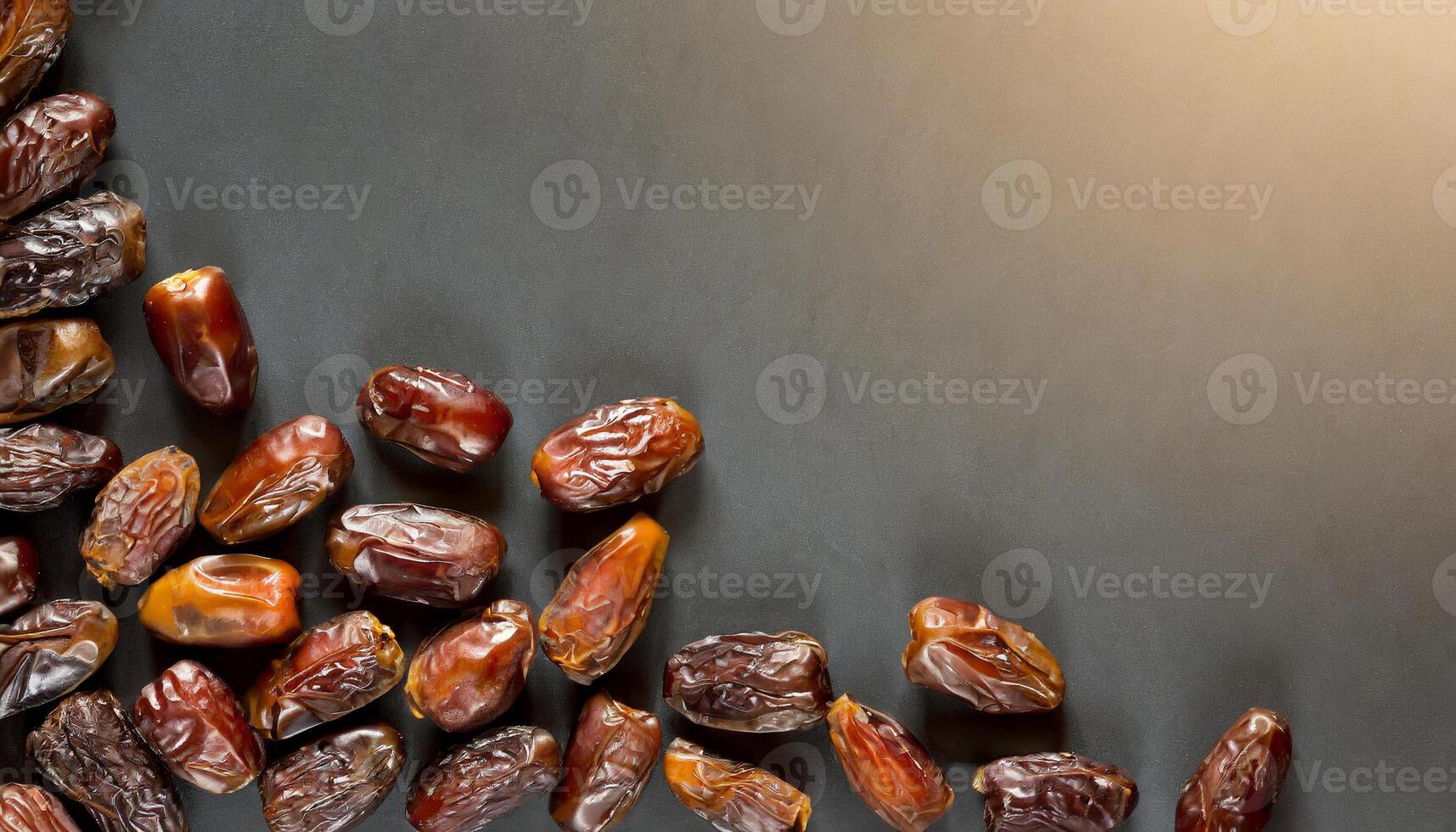 AI generated A top view of A cluster of glossy dates rests on a textured concrete grey surface, capturing natural and culinary aesthetics. Ideal for Ramadan themes, Flat lay. photo