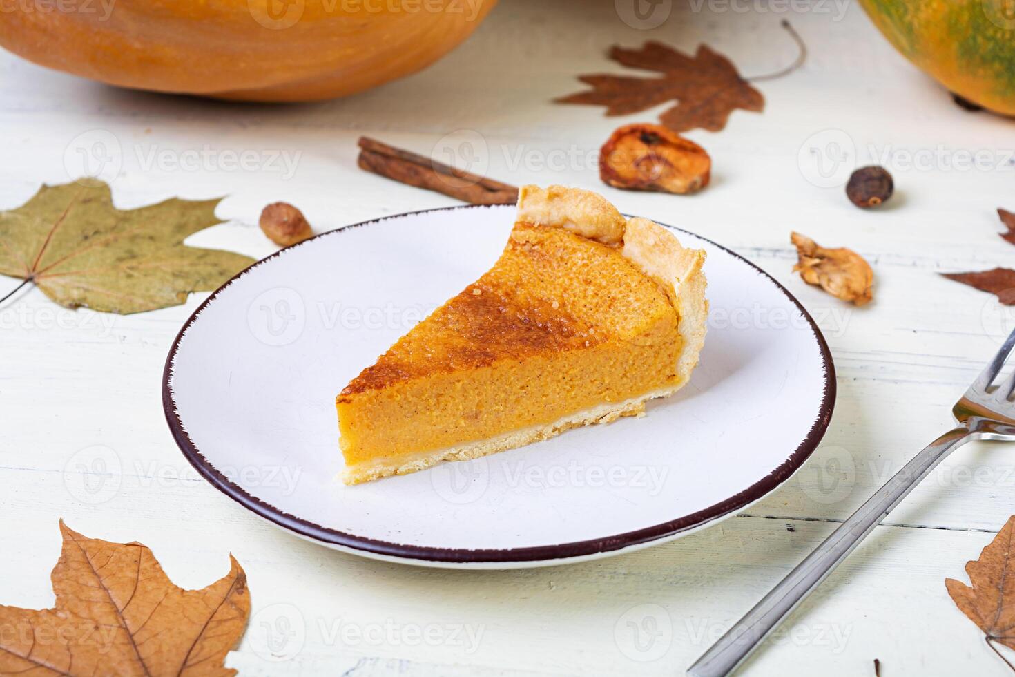 Pumpkin tart for autumn holidays. American pumpkin pie. Halloween background. photo