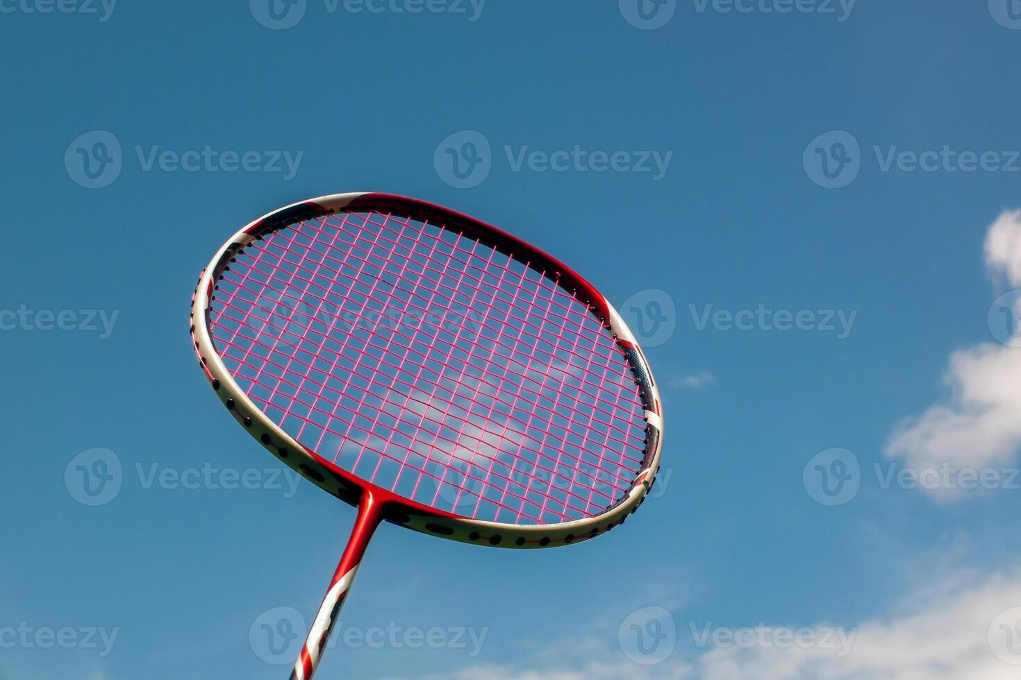 badminton racket on the sky background. Soft and selective focus. photo