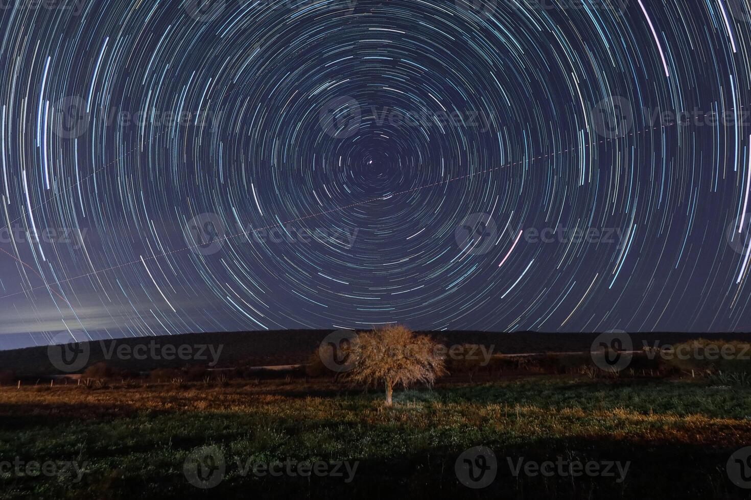 Star swept night sky background, with space for text photo