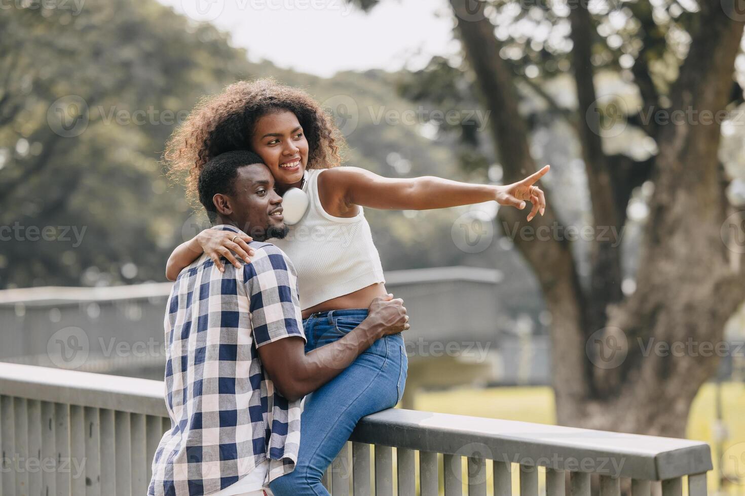 Date couple man and women valentine day. African black lover at park outdoors summer season vintage color tone photo