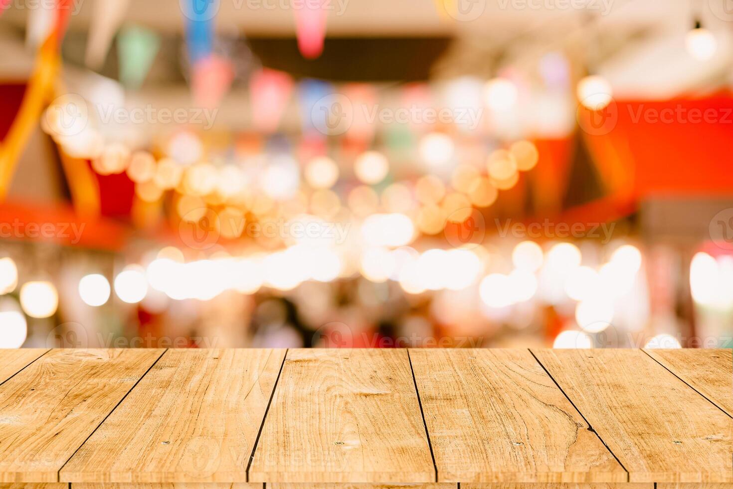 blur night market shopping festival walking street light with wooden space for advertising montage background photo