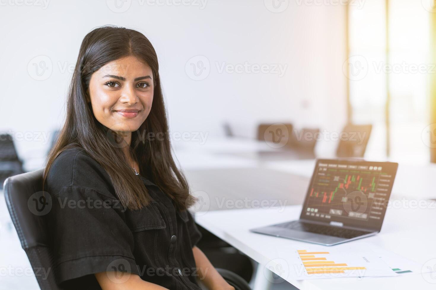 young success india business woman portrait leader confident happy smiling in office photo