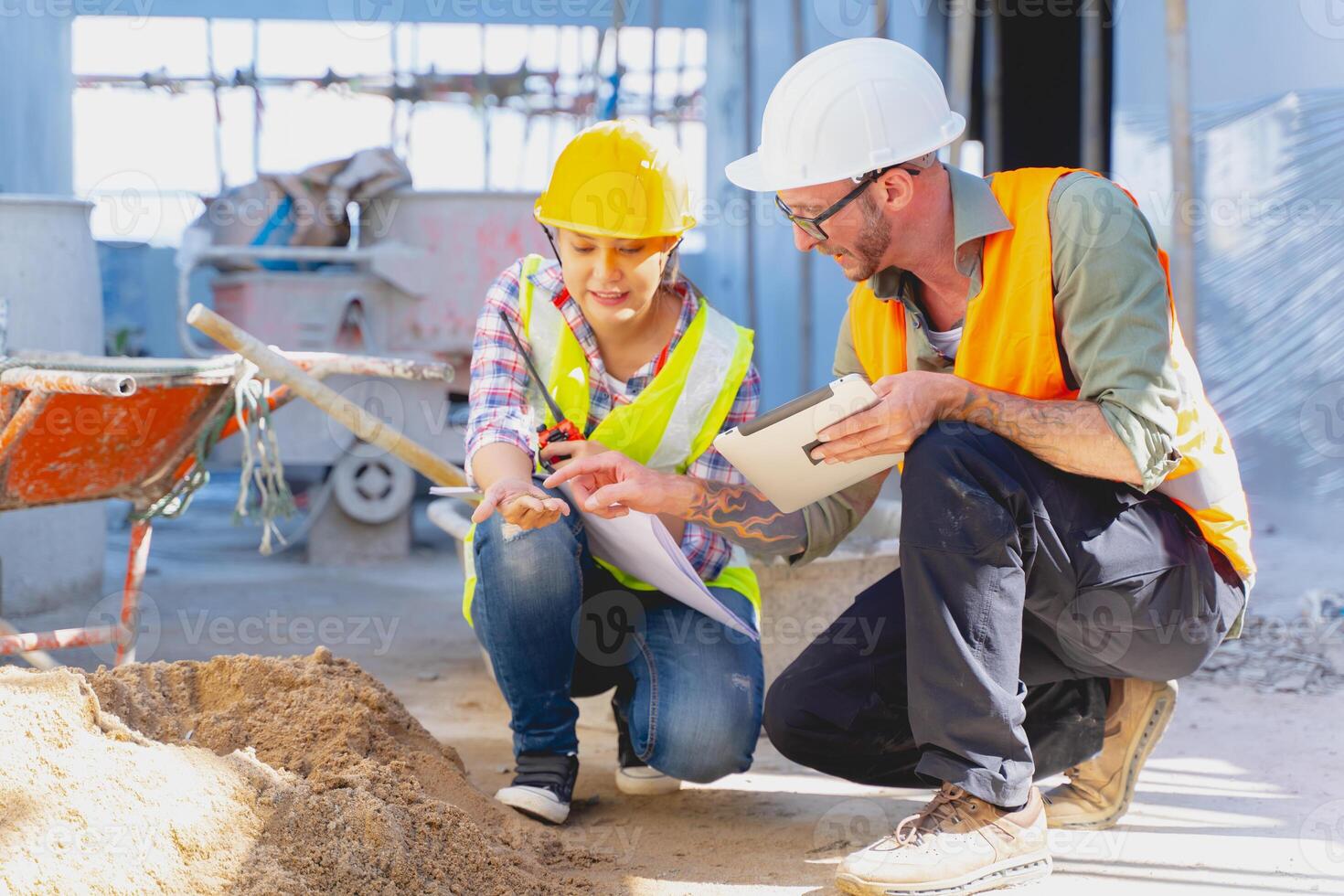 construction engineer team check quality of build sand material for strength quality of new building photo