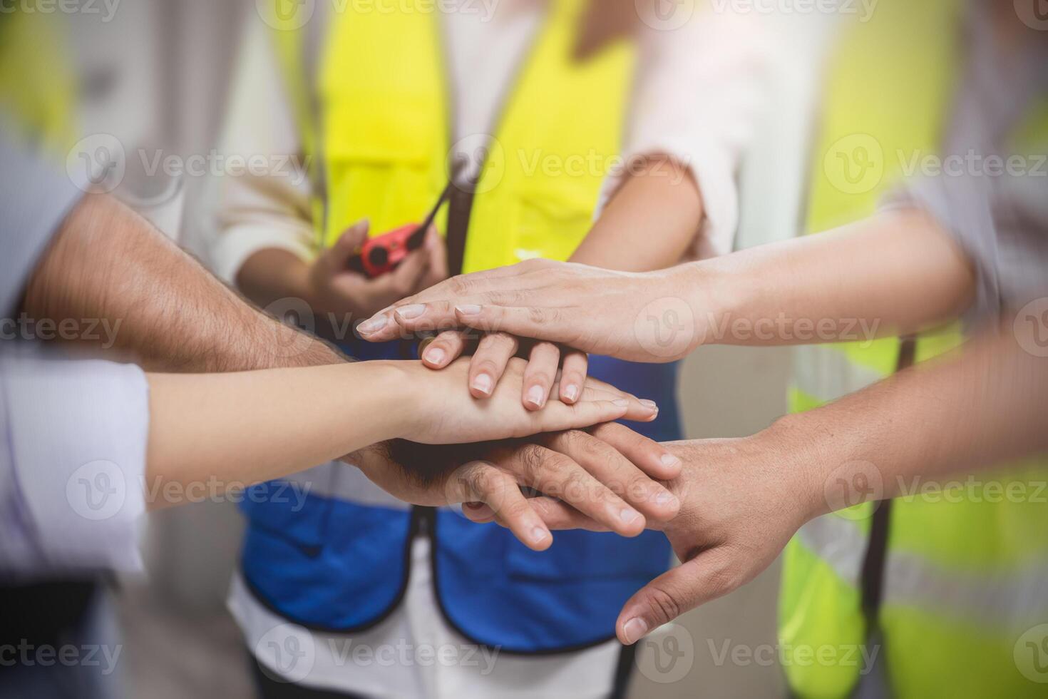 engineer worker teamwork join hand together for strong work group team photo