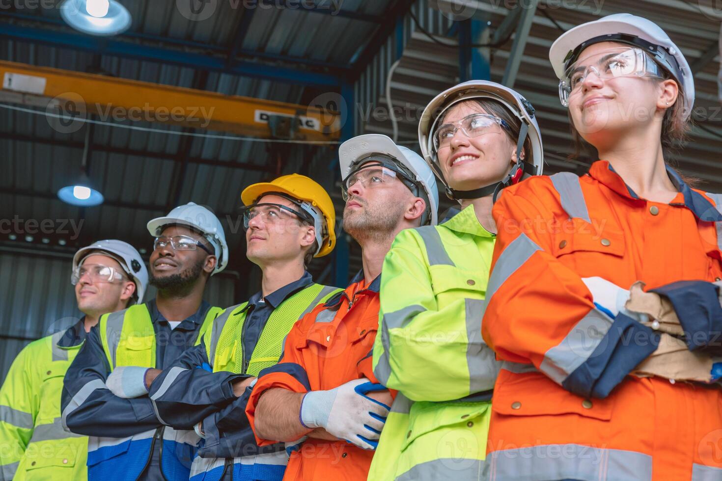 people group of engineer technician and service team worker in safety suit standing together happy smile photo
