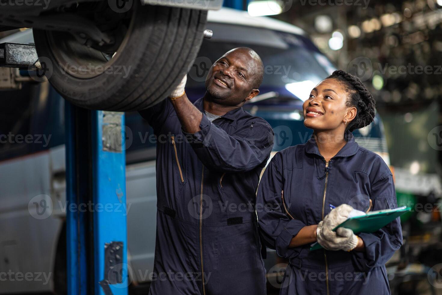 garage mechanic team working car auto service black african people professional worker together photo