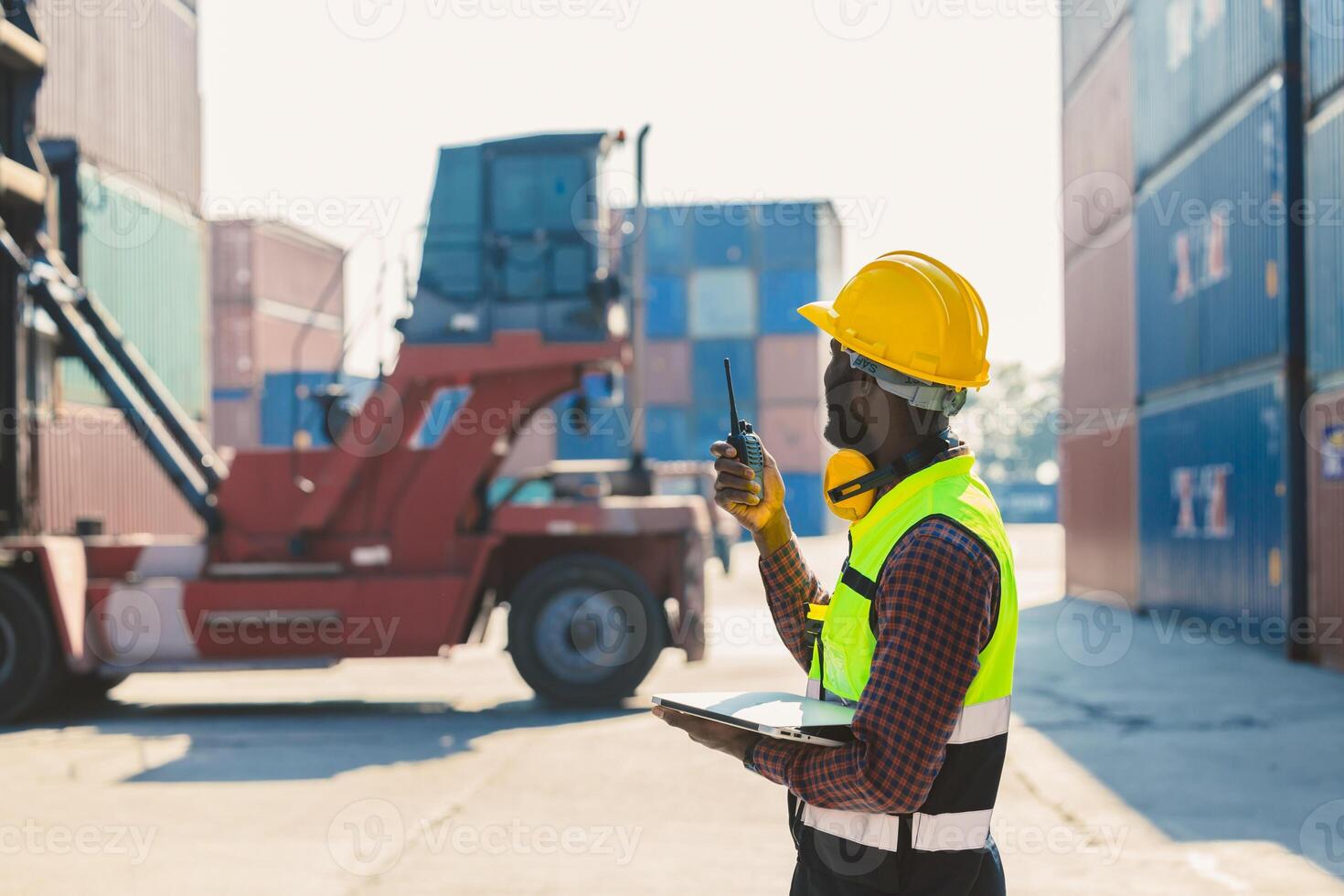 customs shipping staff worker working at cargo port container ship yard with radio control photo