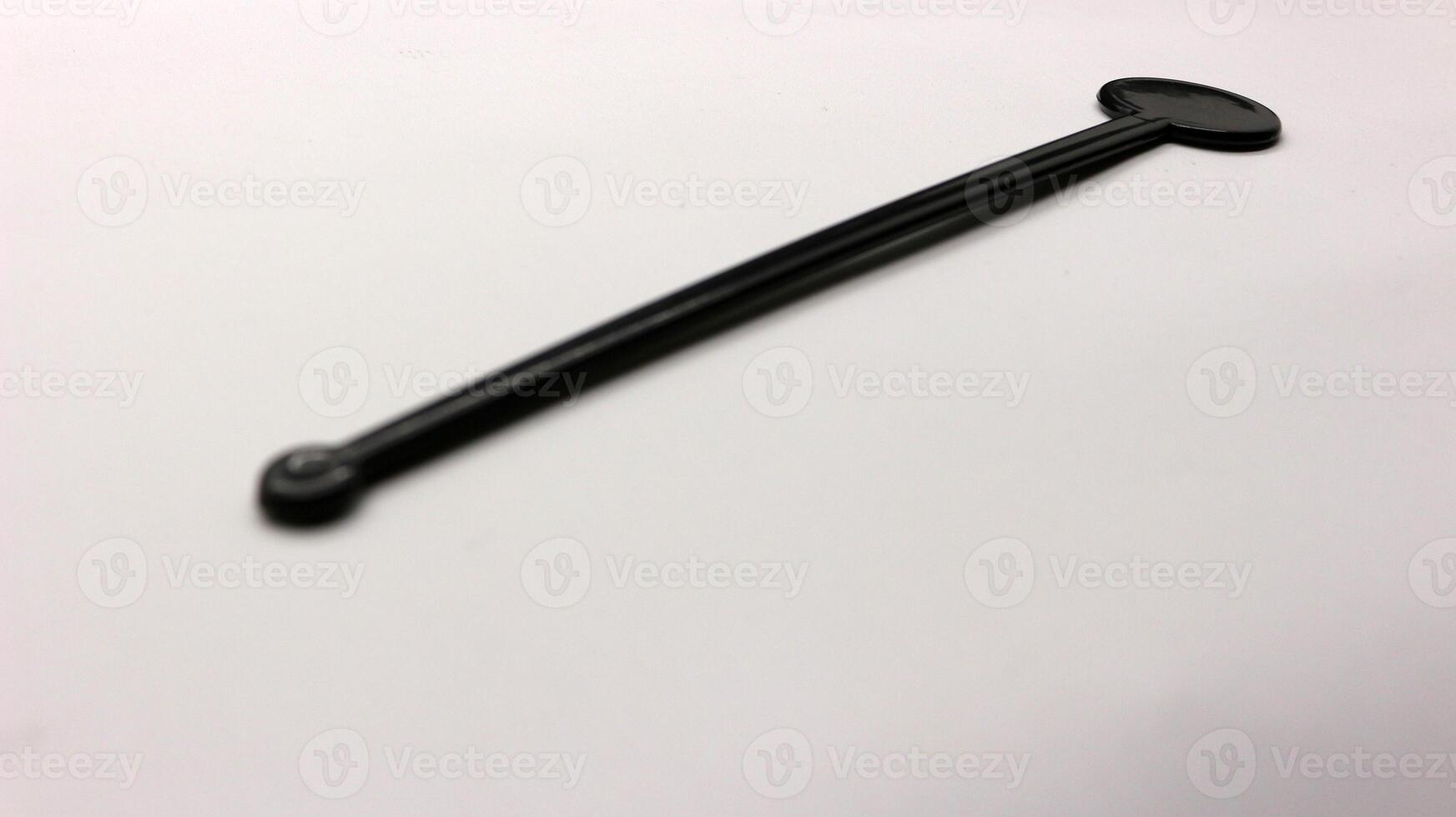 Cocktail stirrer isolated photo