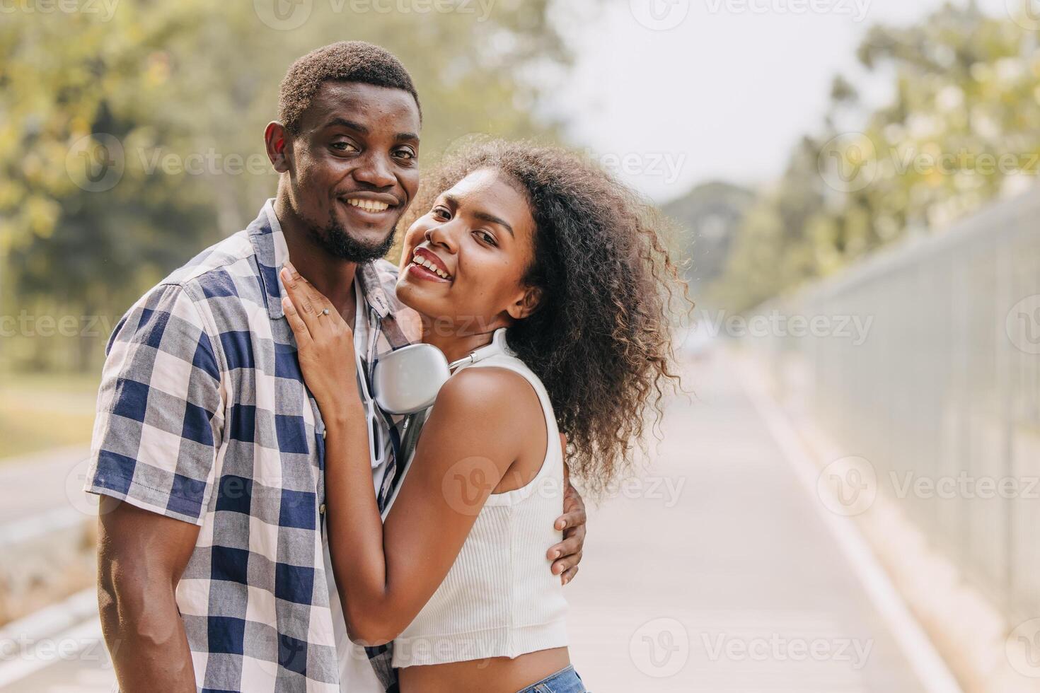 Date couple man and women valentine day. African black lover at park outdoors summer season vintage color tone photo