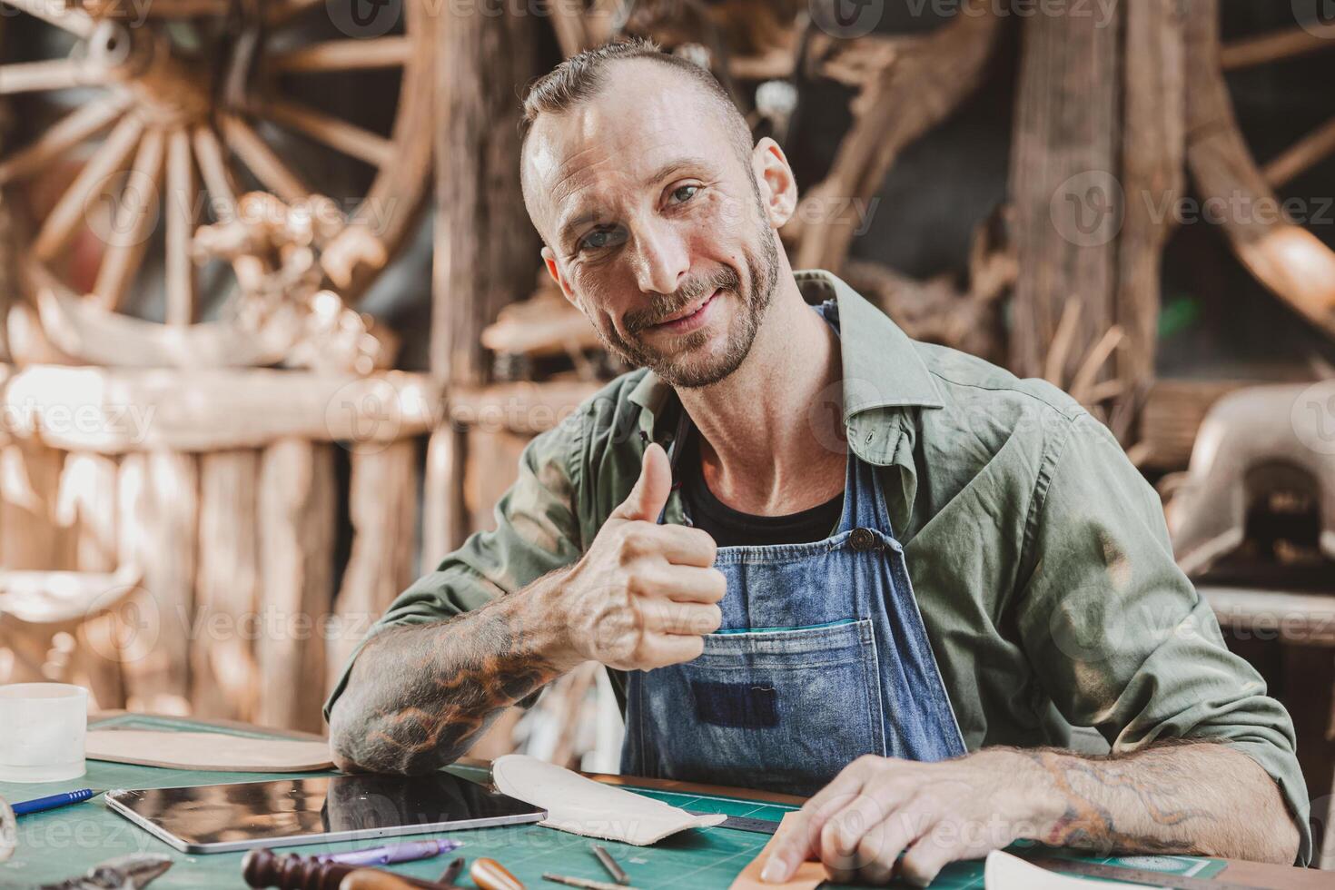 portrait artist with tablet computer for helping design sale product and marketing contacts customer happy thumbs up photo