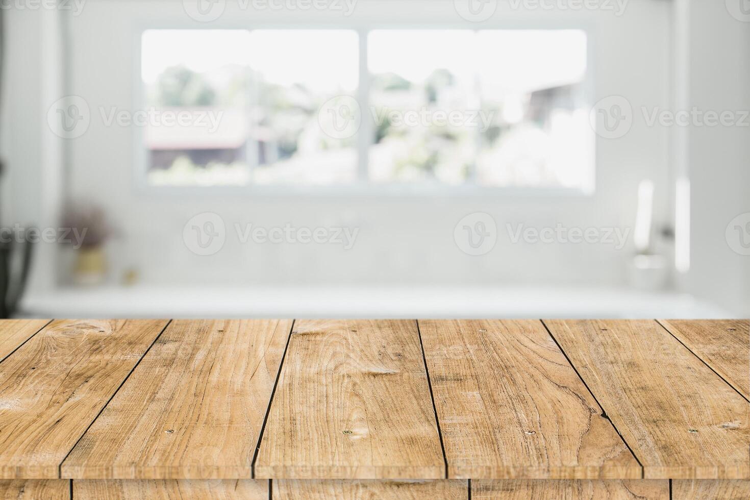 blur white interior room windows with wooden table space for products montage advertising background photo