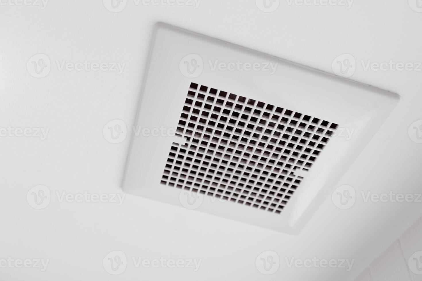 Toilet air ventilator.Bathroom fan air flow grill for room deodorizing and dehumidifying. photo