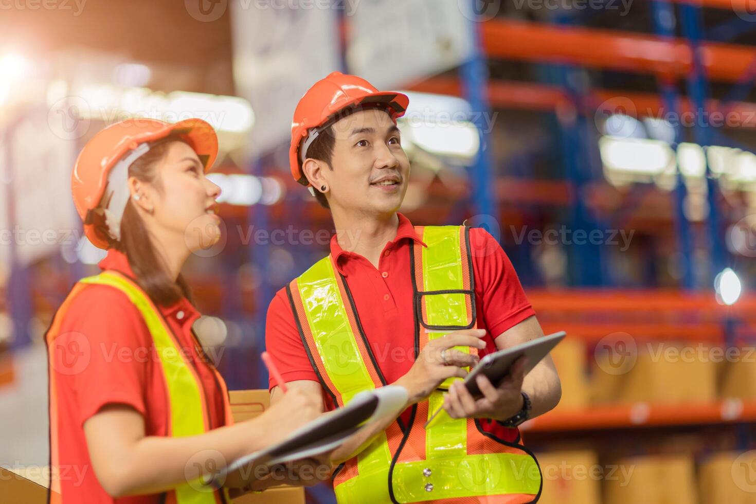 warehouse teamwork working together male and woman staff worker enjoy check products shipping inventory stock photo