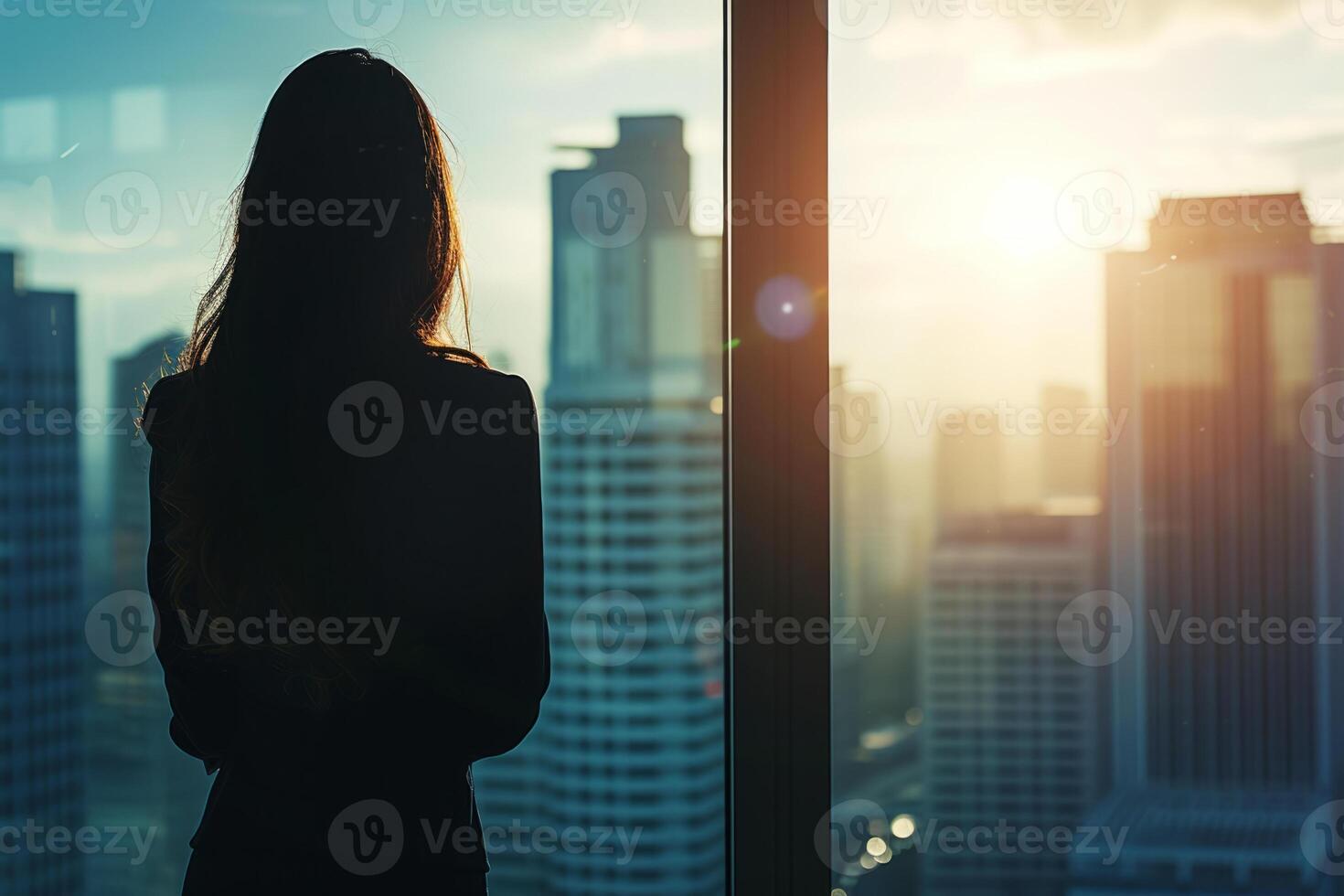 AI generated Back view of a a young businesswoman looks at a cityscape from an office window. Generative AI photo