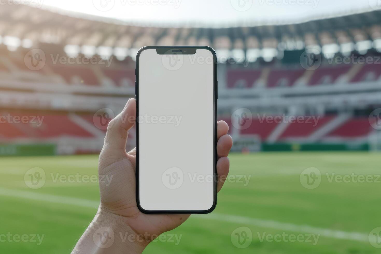 AI generated Hand holding smartphone with blank screen by the football stadium on the background. Generative AI photo