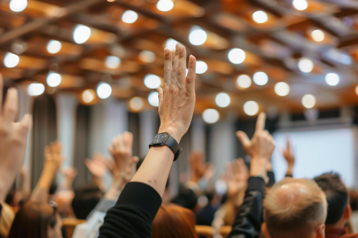 AI generated Audience Raising Hands at an Event with AI generated. photo