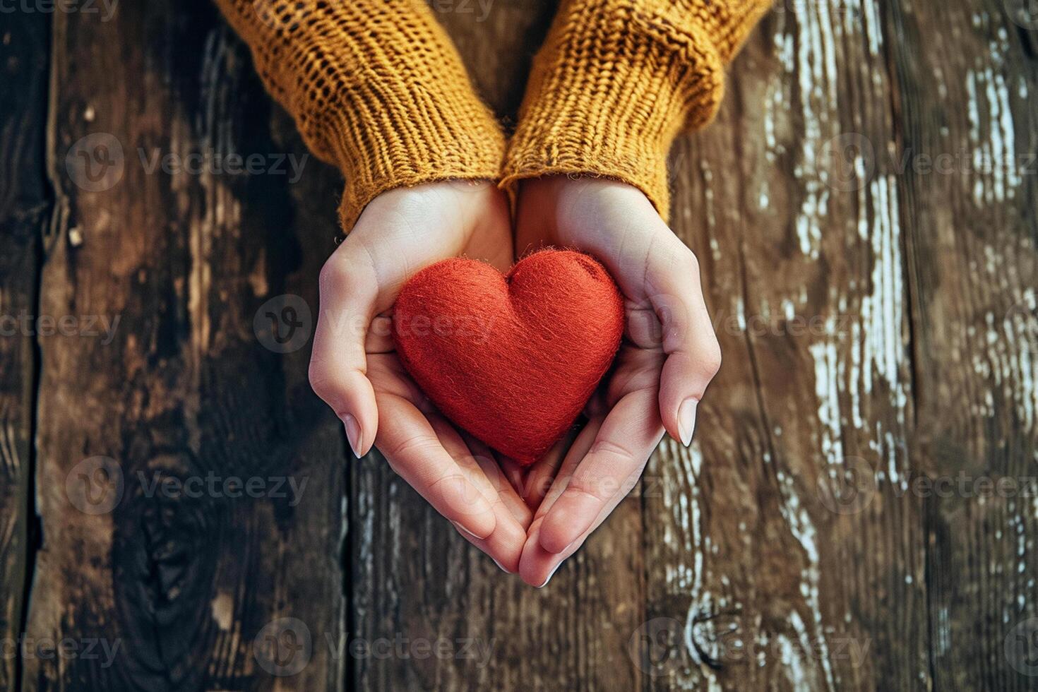 AI generated Two hands hold a red heart against an aged wooden backdrop photo