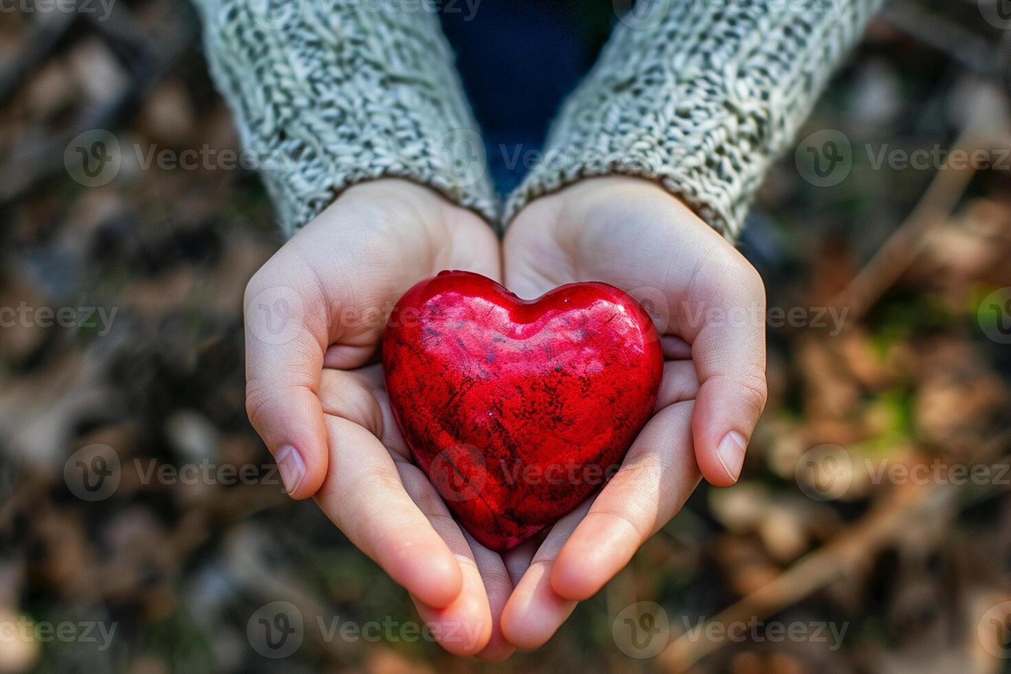 AI generated a pair of hands holding a vibrant red heart-shaped object set against a natural backdrop photo