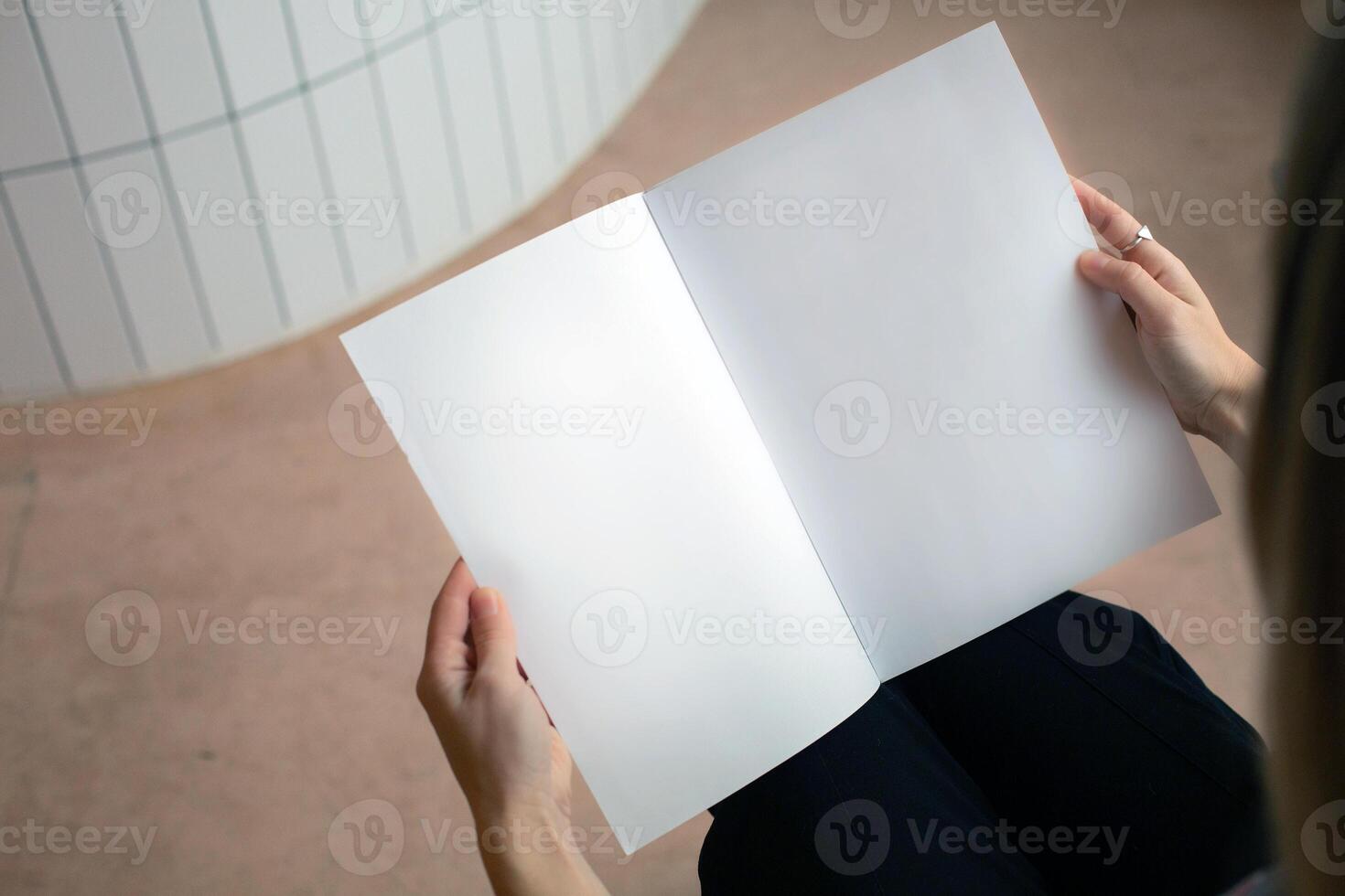 A book with a blank empty cover mockup template photo