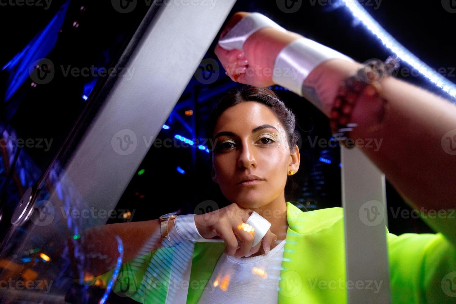 night city portrait of a girl in neon light photo