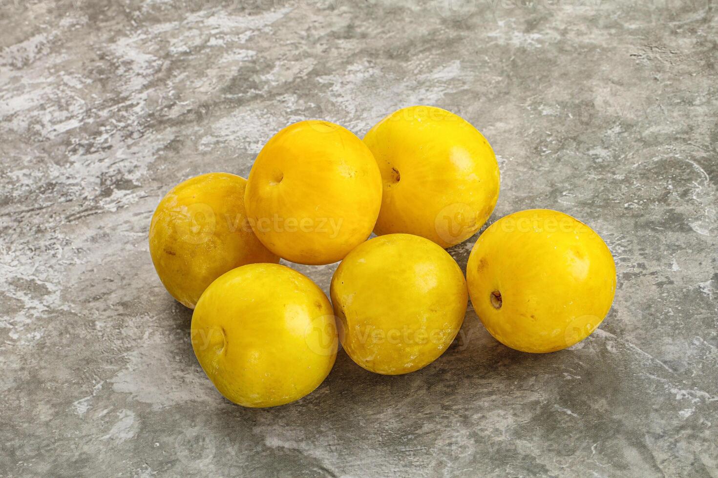 Yellow sweet plum heap fruit photo