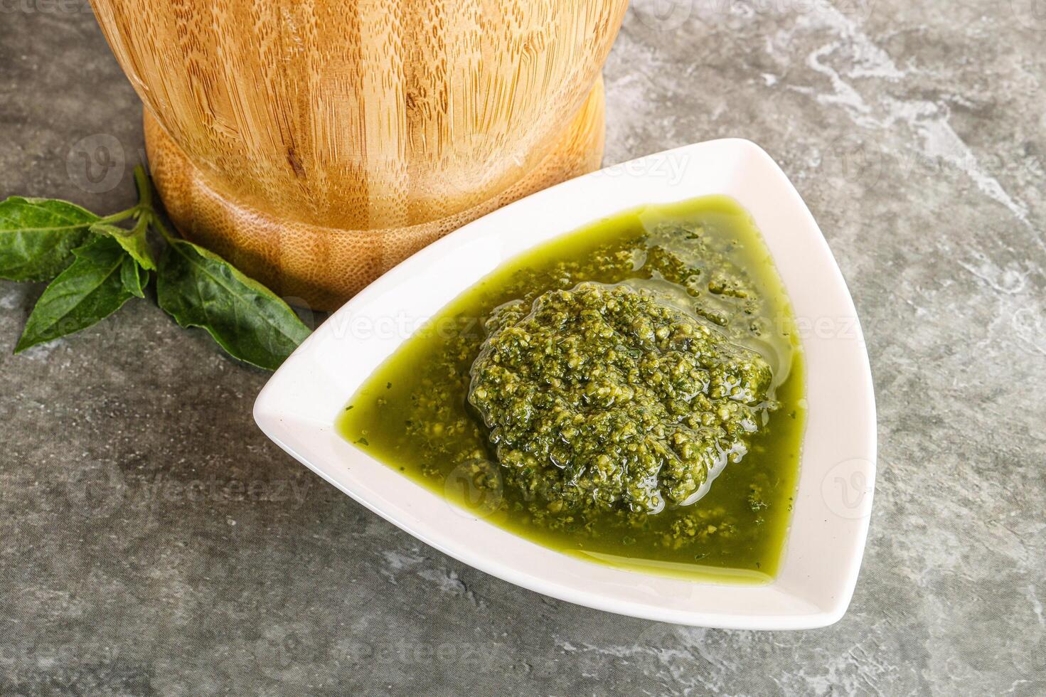 Homemade vegetarian basil pesto sauce photo