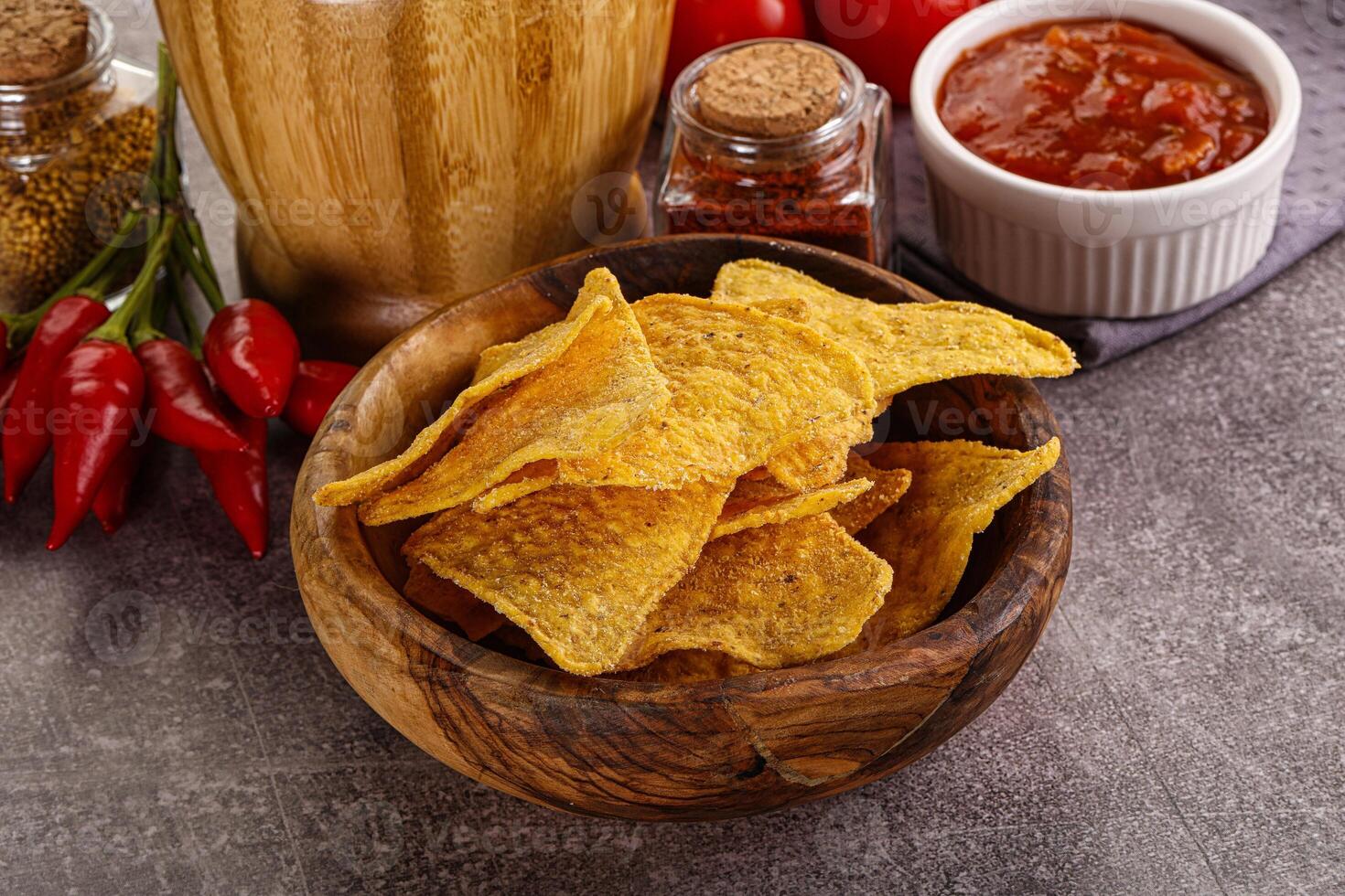 Mexican corn nachos chips with salsa photo