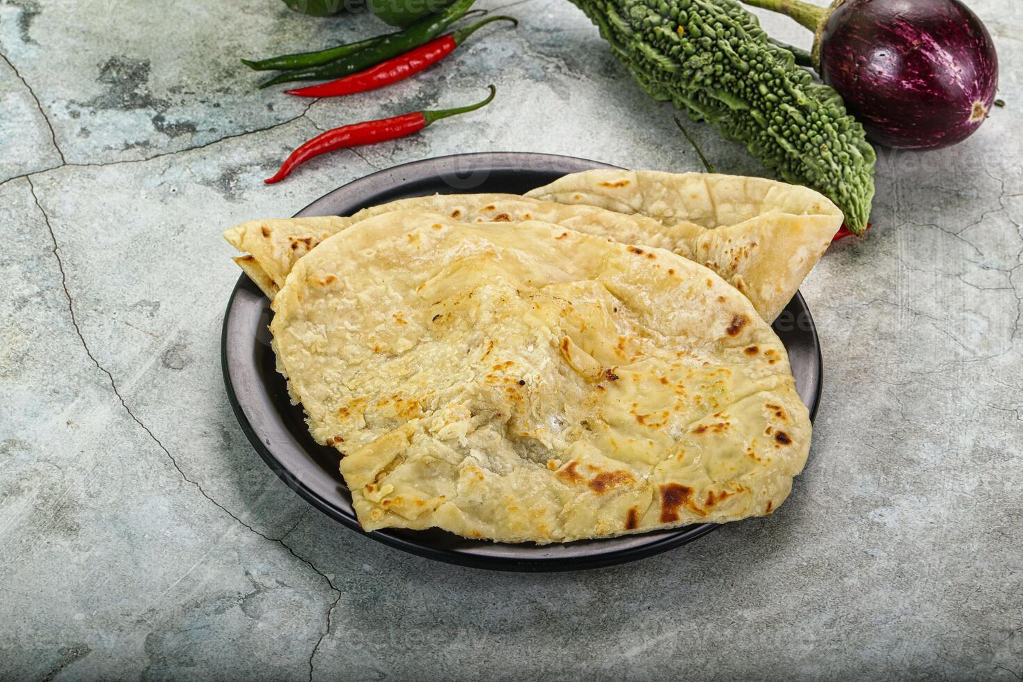 Indian tandori bread - naan with cheese photo