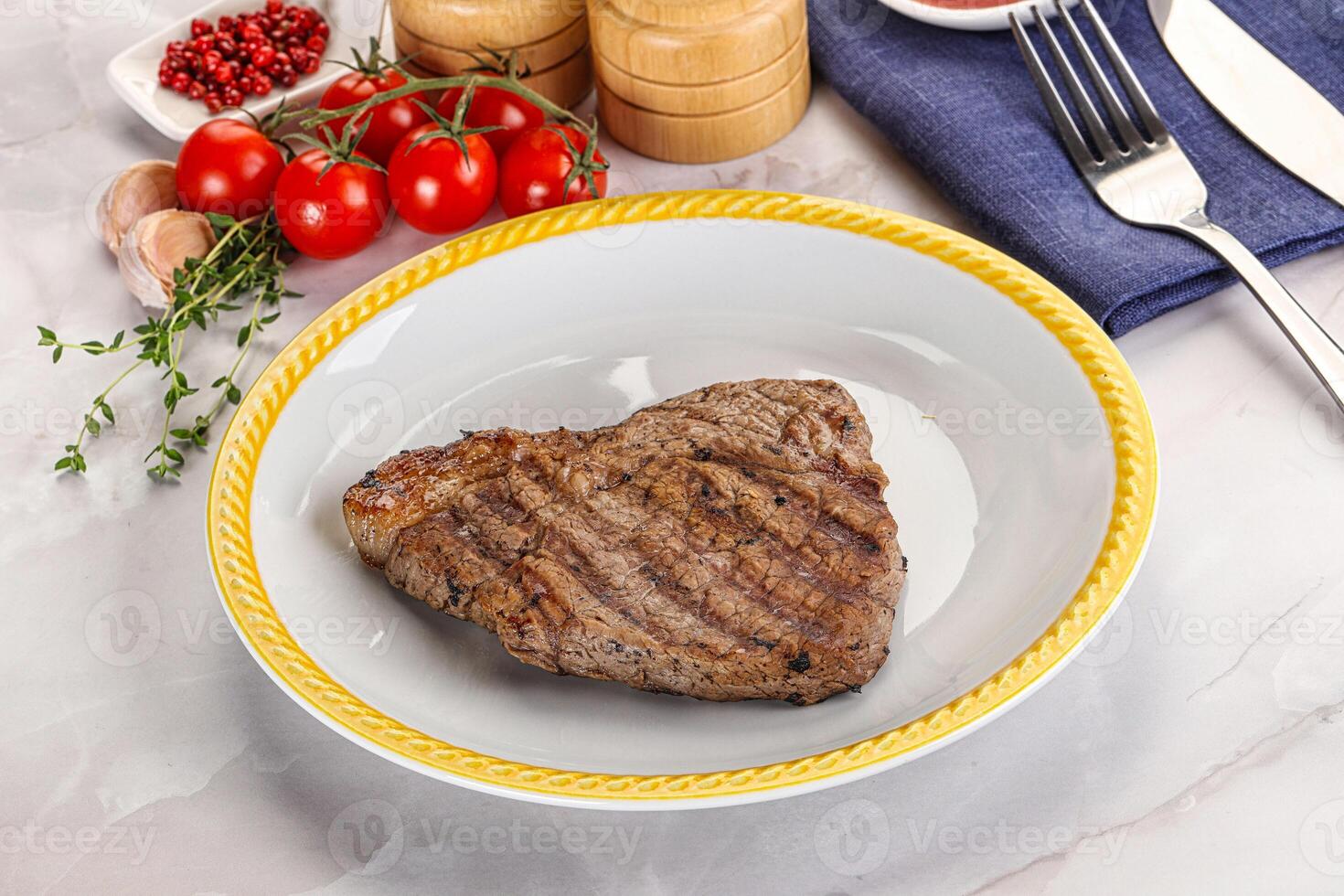 Grilled marble beef steak with sauce photo