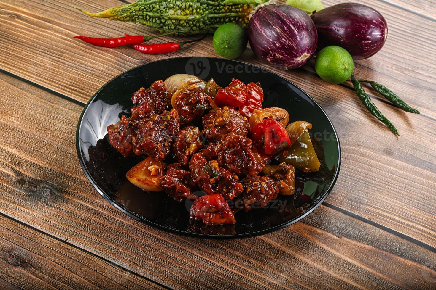 Asian cuisine - pork with chili sauce photo