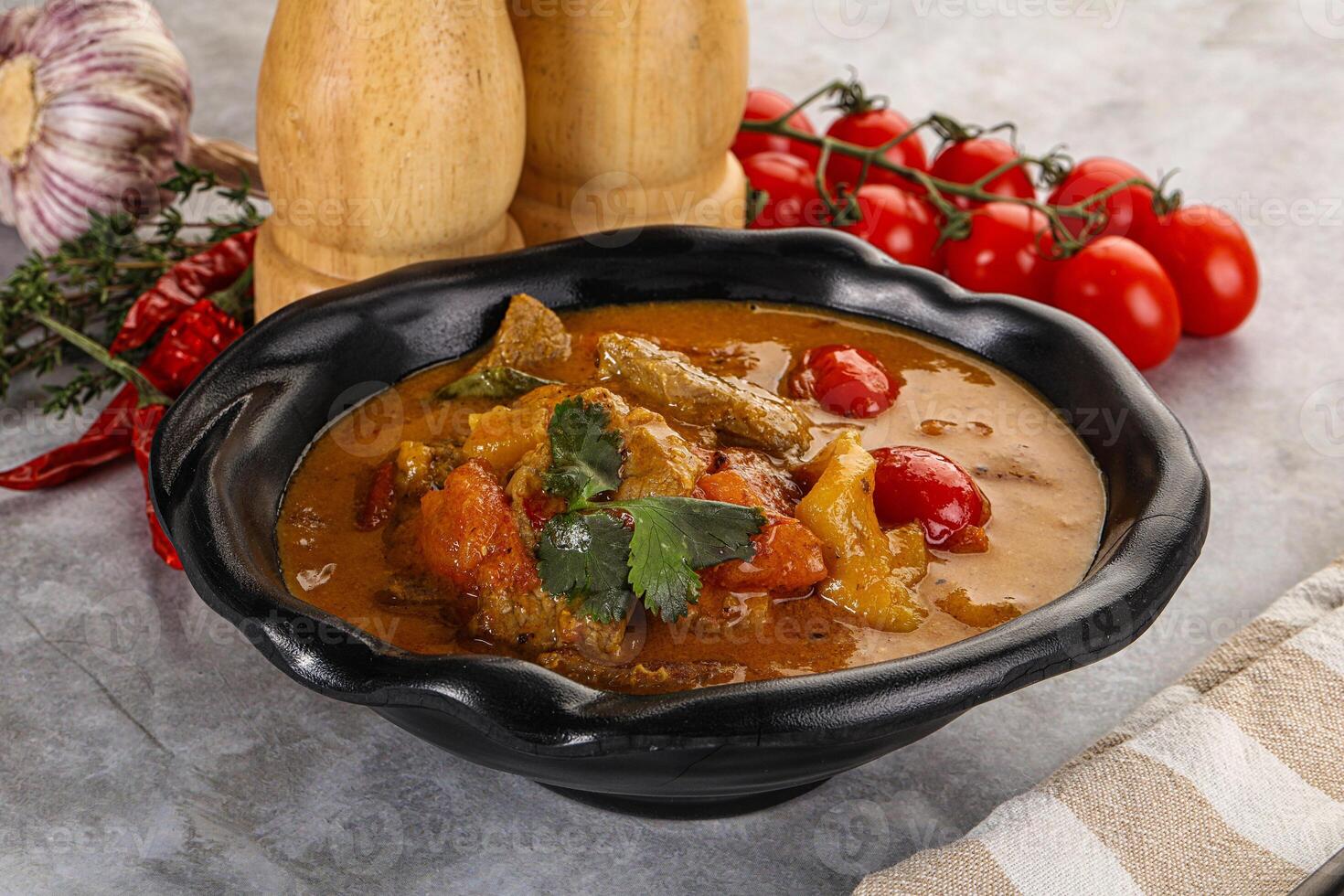 Yellow Thai curry with beef photo
